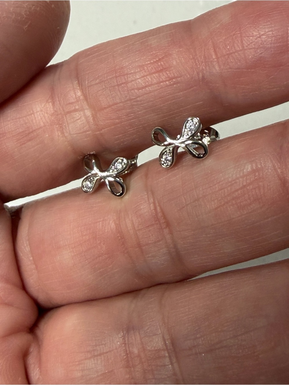 Pretty Bird USA Silver-Plated Bow Stud Earrings with CZs